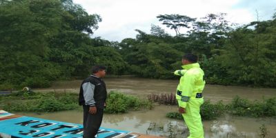 Agenda Sungai Meluap Akibat Hujan Deras Di Desa Kalirejo